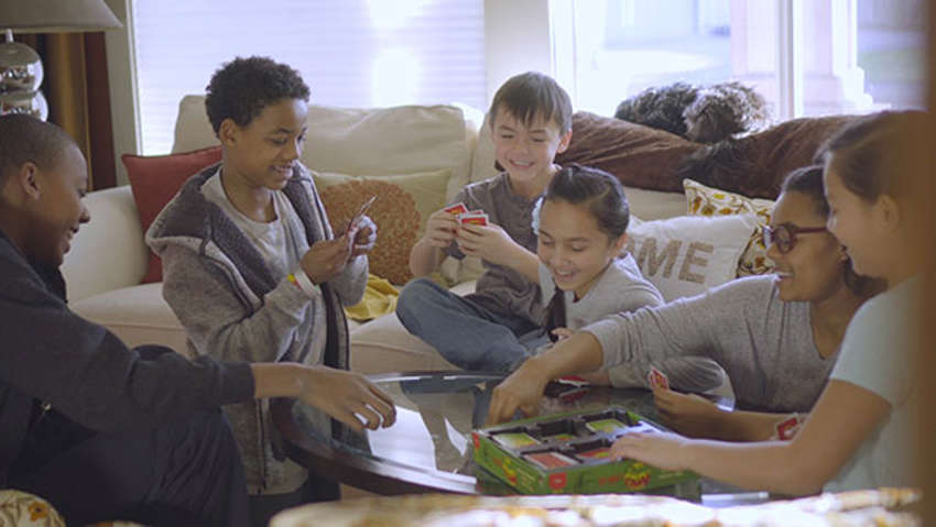 Foster family plays games in their home