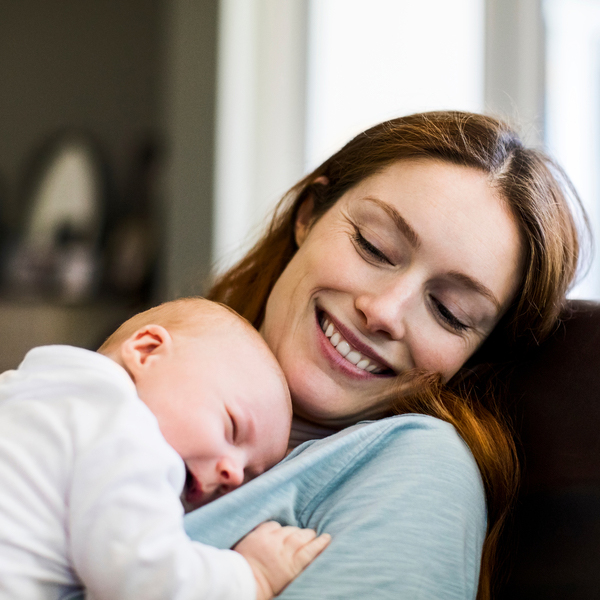 Young, white Host Mother cares for infant baby