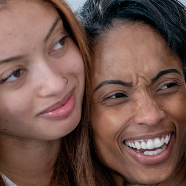 An African American foster mom with two teen girls 